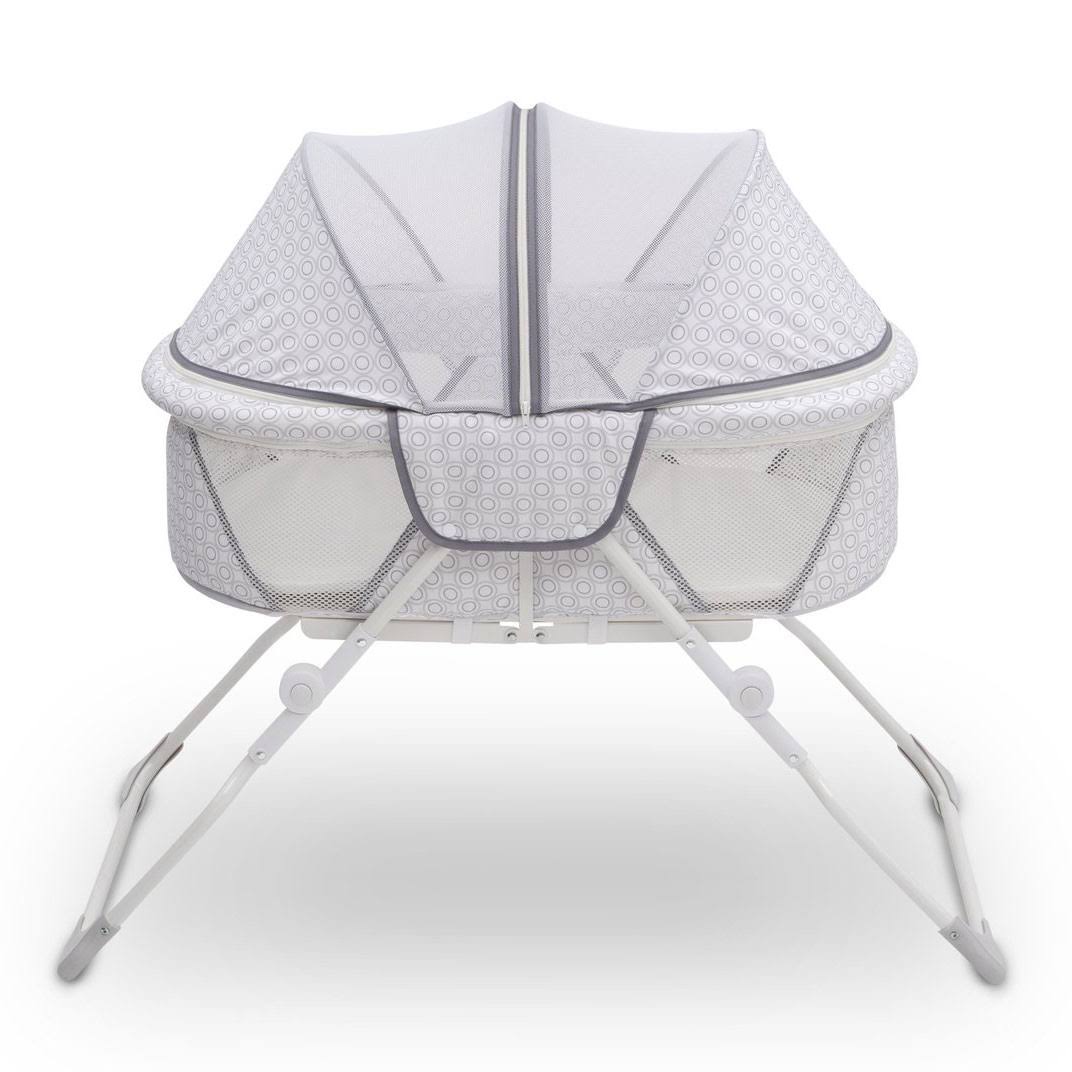 Delta Children EZ Fold Ultra Compact Travel Bassinet, White